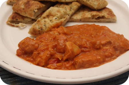 Naanbrood met Curry van Kipfilet en Tomaat