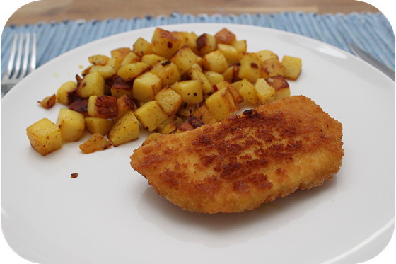 Kaasschnitzels met Bombay aardappeltjes